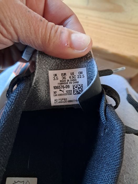 Chuteira modelo Puma Rapido III FG/AG
