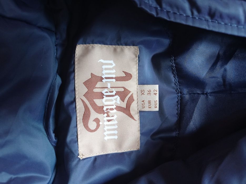 Пуховик синьо-фіолетового кольору дуже теплий