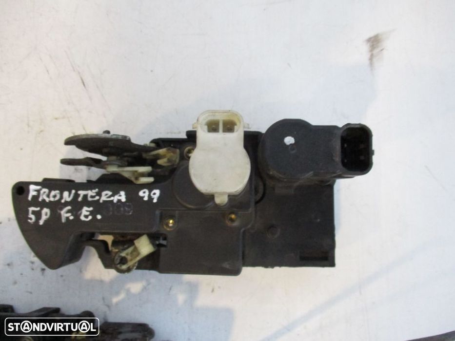 Fechadura porta Opel Frontera B 5p frente esquerdo / direito