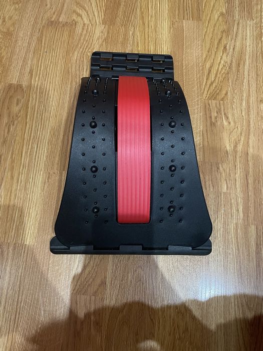 Масажер для спини