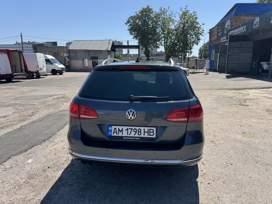 Volkswagen Passat 2014 VIN WVWZZZ3CZFE008379 фото оголошення 4 з 8