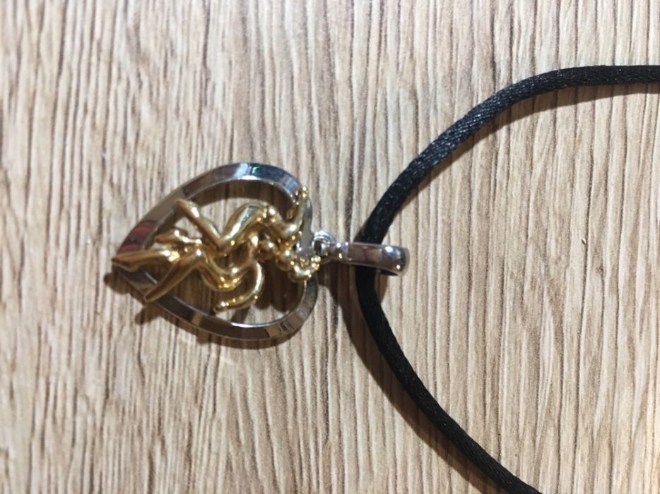 Wisiorek - przepleciona para w sercu :)