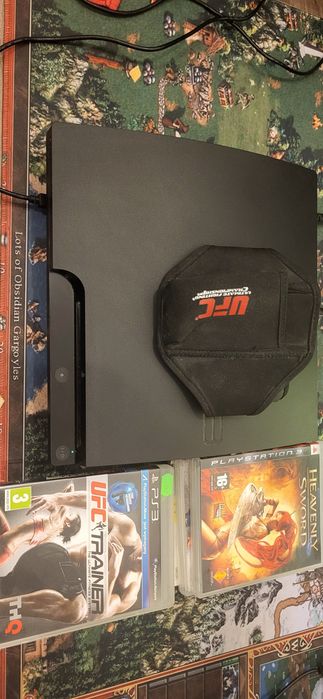 PlayStation 3 PS3 Slim 320GB + Heavenly Sword + opaska UFC +gry