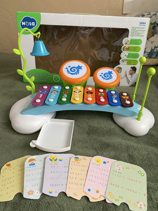 Ксилофон з барабанами дзвіночком нотами музикальна іграшка