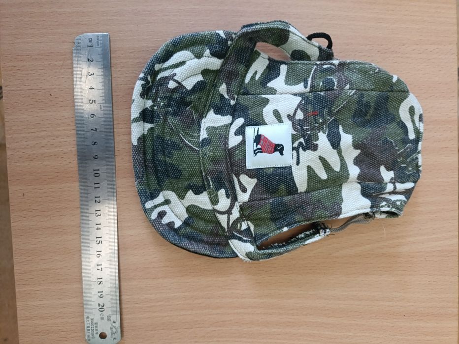 Захисні шапочки для собак.