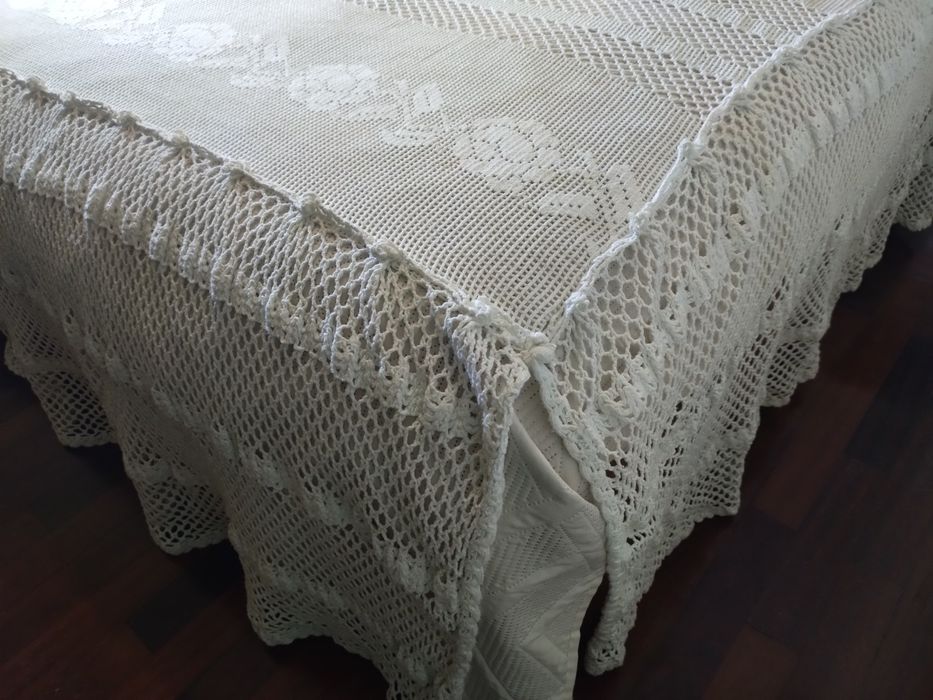 Colcha de renda com oferta panos