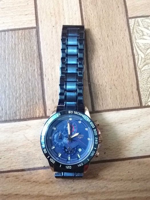 Lige годинник з коробкою