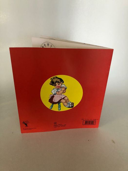 Livro infantil com relógio com ilustrações anos 50