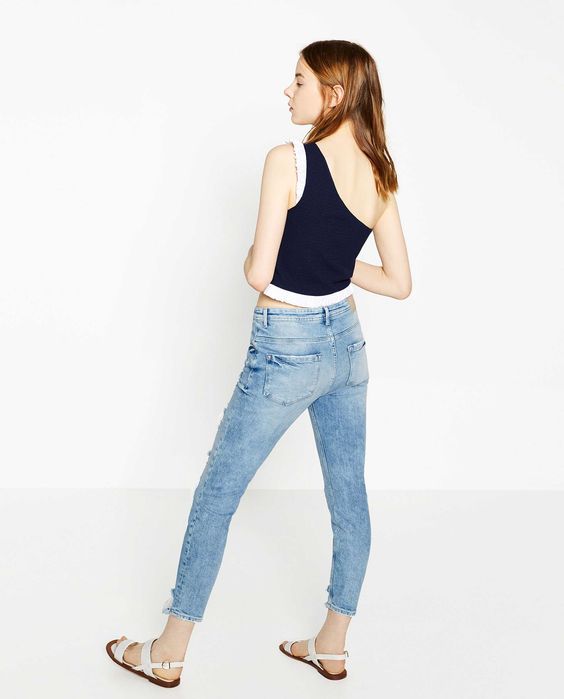 Nowe jeansy Zara z dziurami