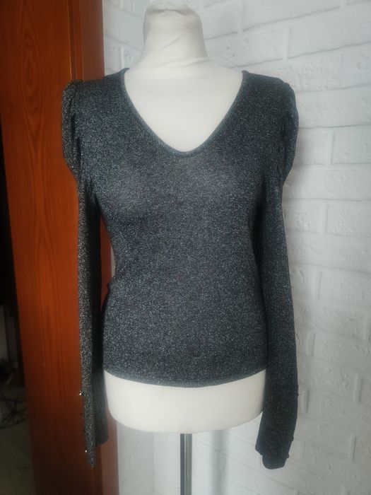 Brokatowa bluzka z bufkami na ramionach 36 S_38 M
Elastyczna brokatowa