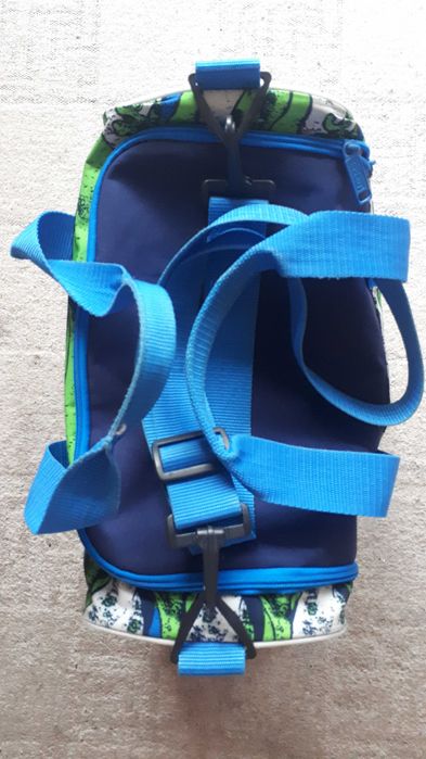 Яркая небольшая спортивная сумка Scout синяя с салатовым.