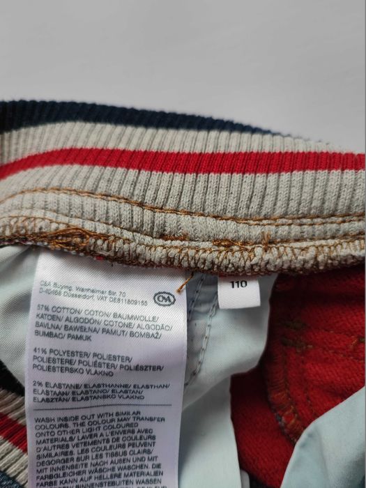 Jeansy niebieskie z meszkiem wiązane C&A r. 110