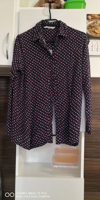 Koszula damska w groszki.