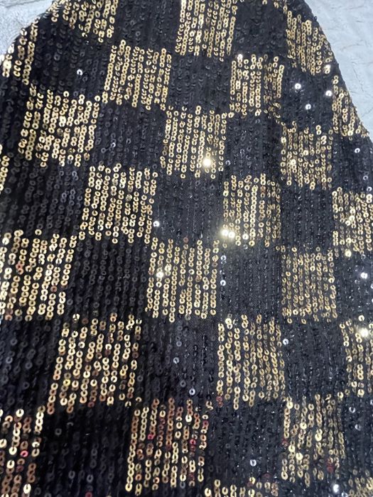 Топ в паєтках