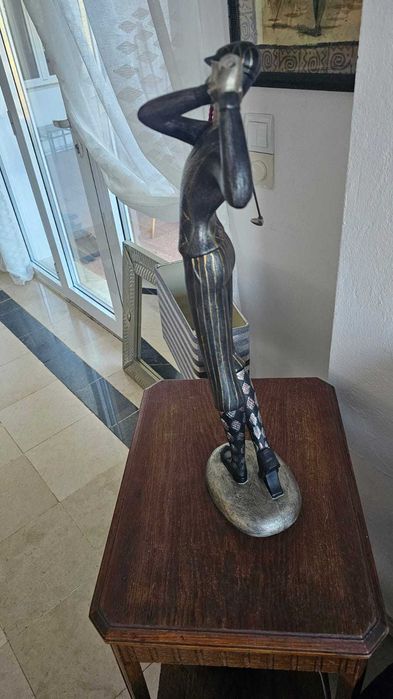Estatueta de golfista