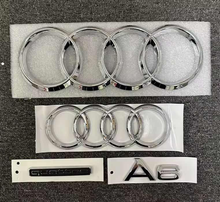 Кільця Audi в решітку багажник на всі моделі хром,чорний глянець