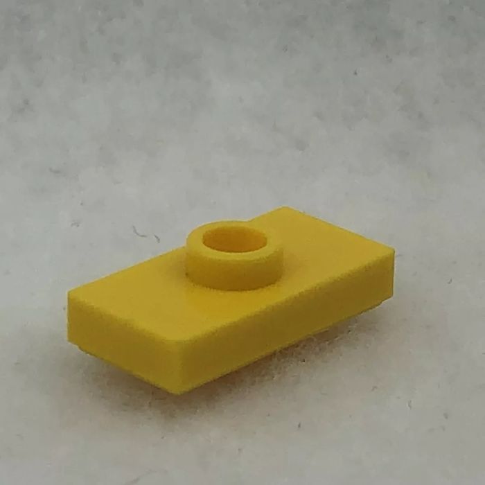 LEGO płytka 1x2 wypustka żółty 15573
