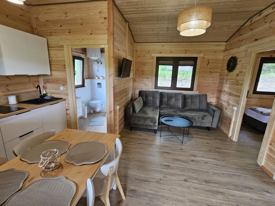 Domki letniskowe Przy Leśniczówce - Sauna - Jacuzzi - Domki nad jeziorem- Bory Tucholskie- Kaszuby, rodzinny wypoczynek, plac zabaw, stawy
