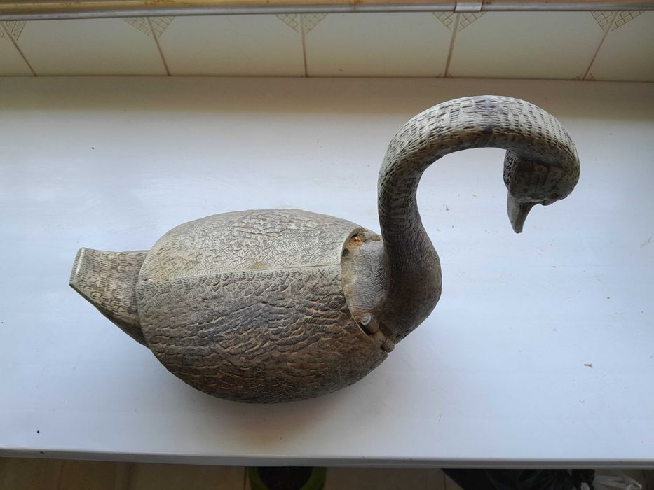 Pato decorativo em metal