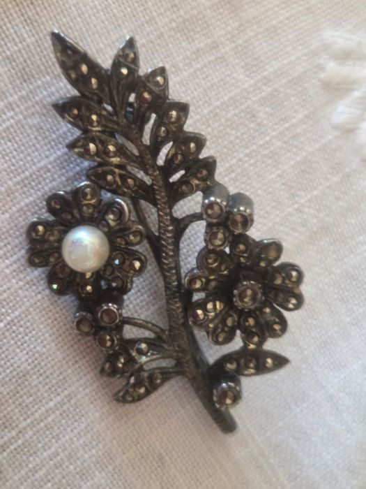 Pregadeira de prata e ouro