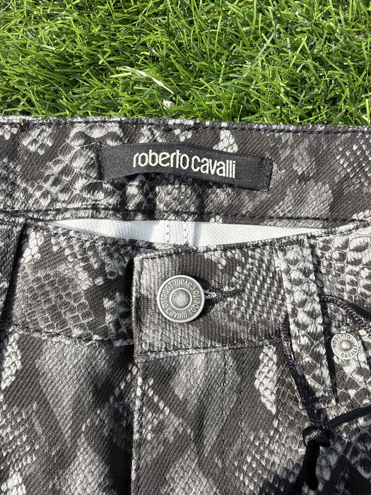 Roberto Cavalli calças flare estampado python