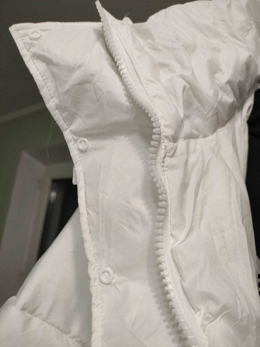 Стьобане пальто з капюшоном