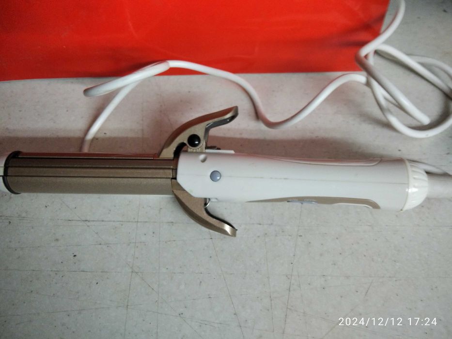 Електроприбор для завивки волостя