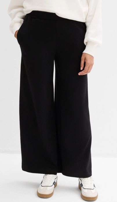 Жіночі штани великого розміру