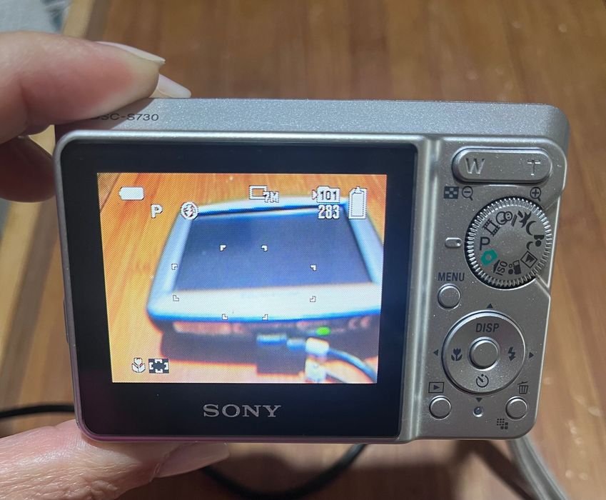 GPS tomtom e máquina fotográfica