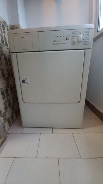 Máquina secar roupa