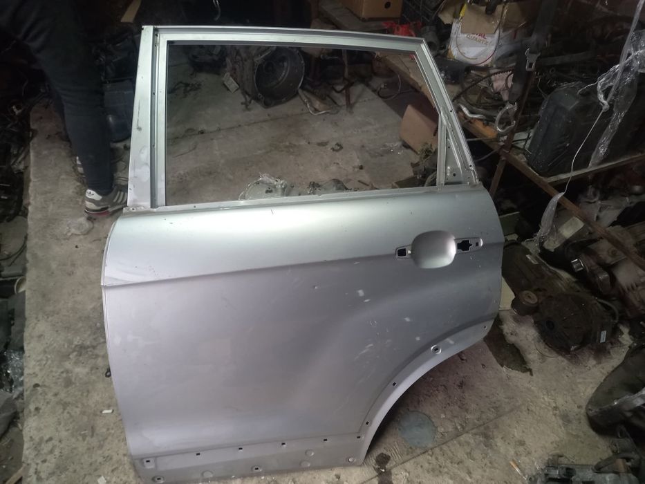 Двері Шевроле каптіва с100