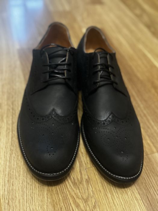 Нові чоловічі туфлі