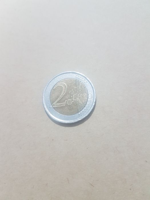 Moeda 2 euros 1999 Espanha. Com defeito.