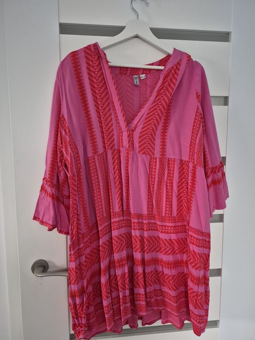 Do sprzedania sukienka z rekawem 3/4