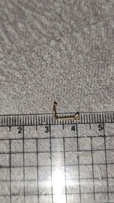 Пирсинг в нос нострил Титан