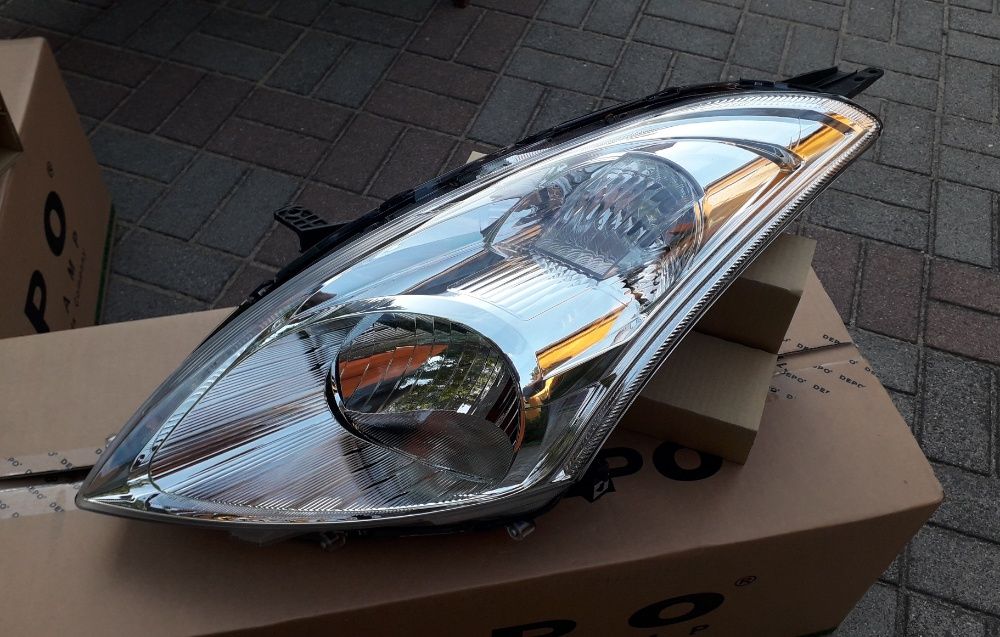 SUZUKI SWIFT MK7 2010 - lampa przednia lewa nowa DEPO