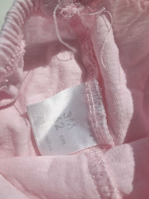 Spodnie niemowlęce dziewczęce różowe 62 bawełna na gumce ściągacze