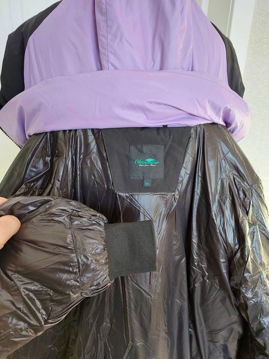 Жіночій фабрічний пуховик.