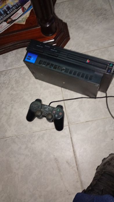 Ps2 fat chipada com 25 jogos e bolsa