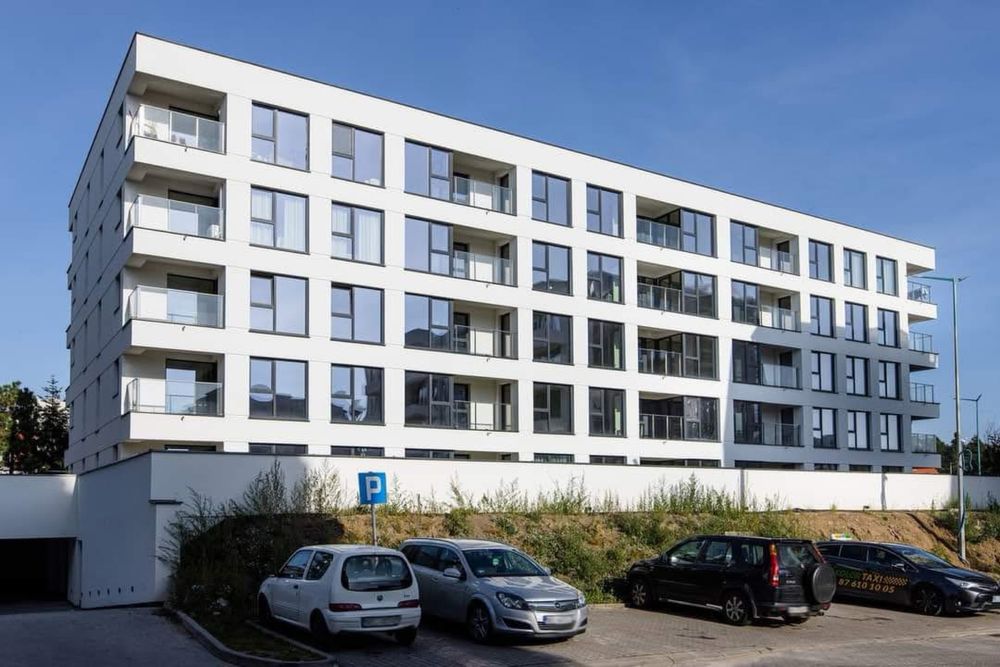 TYNKI maszynowe cementowo-wapienne i gipsowe