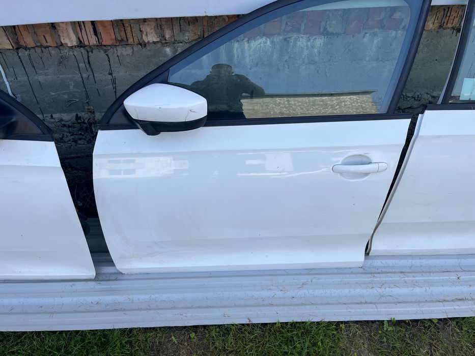 Двері шкода Рапід Skoda Rapid