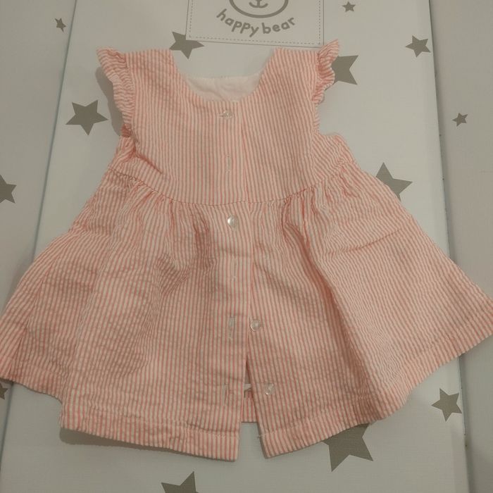 Vestido e calção - In Extenso.