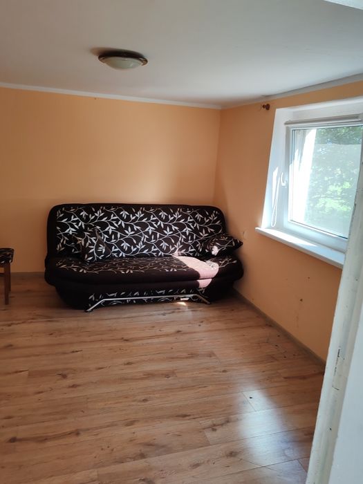 Kanapa rozkładana oraz krzesła