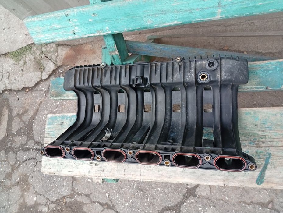Продам на бмв е34 впускний колектор м50б25