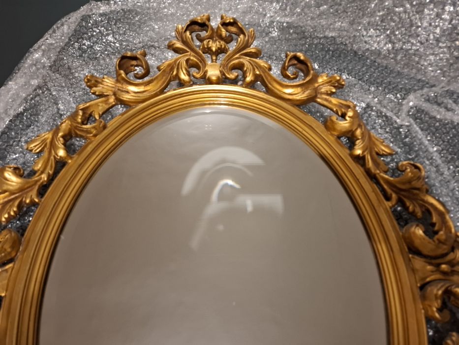 Espelho oval moldura dourada