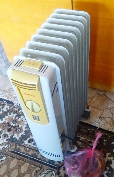 Продам масляный радиатор "SATURN ST-1252" в отличном состоянии 2000W.