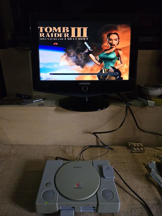 Consola ps1  com um jogo