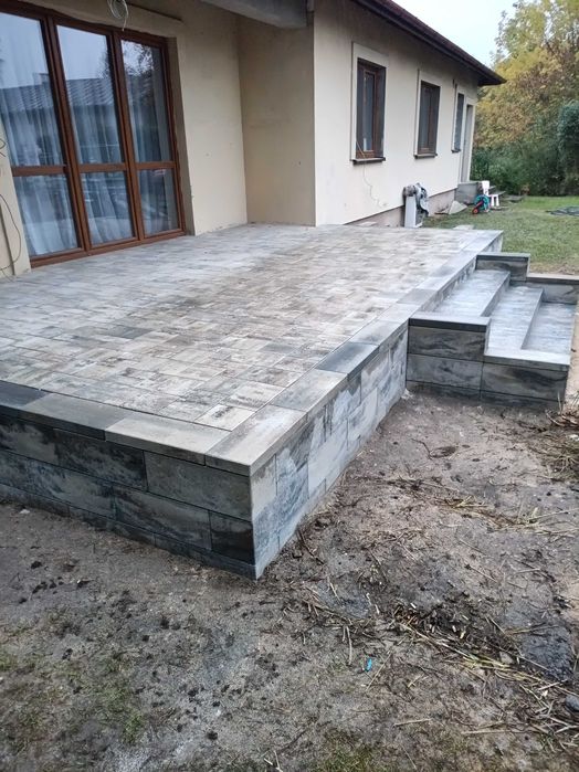 Brukarstwo, układanie kostki brukowej. Kostka brukowa