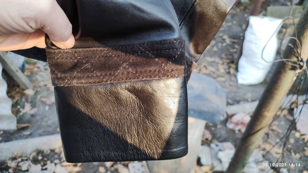 Новая кожанная женская, коричневая  курточка