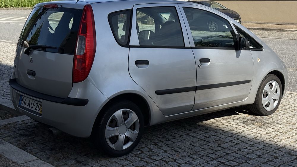 Vendo ou troco Mitsubishi Colt APENAS 130.000km